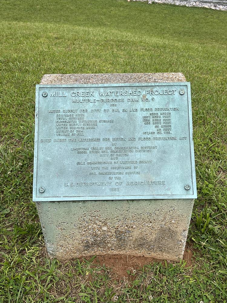Cast bronze dedication plaque, masked and ready for restoration